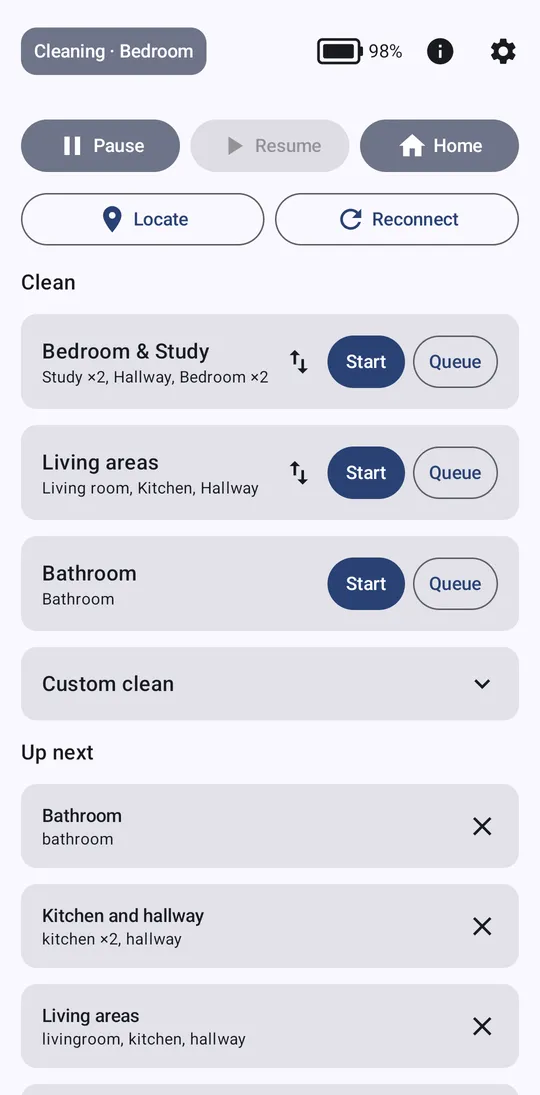 Android app showing the robot cleaning, battery level, pause, resume and home buttons, saved cleans with Start and Queue buttons, and the queue