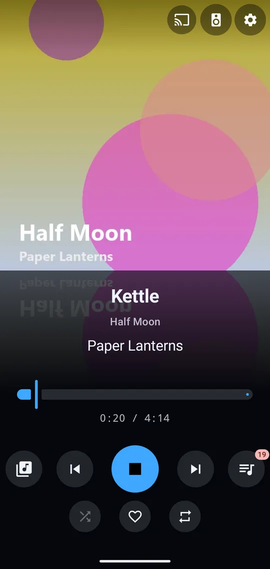 The player screen with large album art, track details, a seek bar and transport buttons