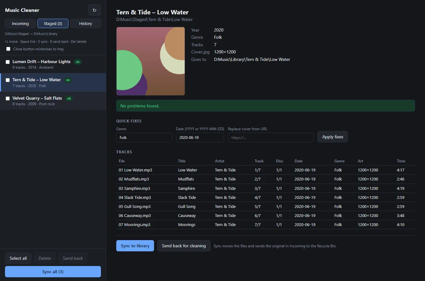 The Music Cleaner Staged screen showing a cleaned album with cover, quick fixes and a track table